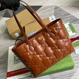 Handle and strap detail of modern everyday-luxe women's handbag – women's designer-style accessory