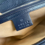 Side profile of elevated sleek women's handbag – women's designer-style accessory