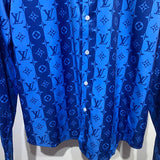 Flat lay presentation of Louis Vuitton cotton t-shirt with signature branding