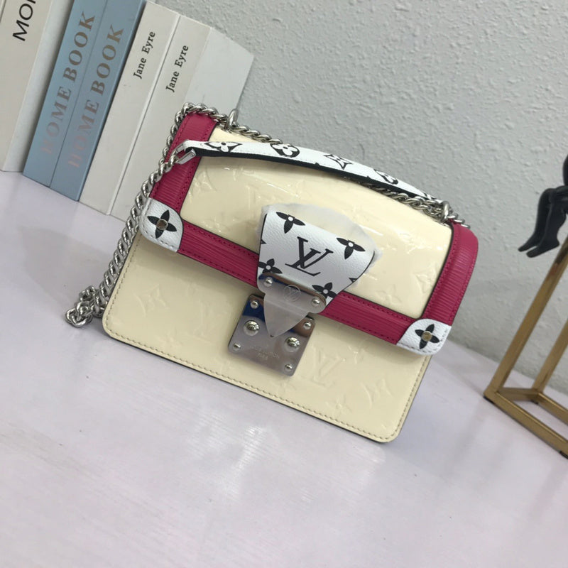 Side profile of refined signature women's handbag – women's luxury handbag