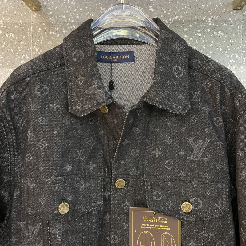 Flat lay presentation of Louis Vuitton luxury clothing with label-forward styling