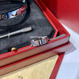Close-up detail view of Cartier unisex jewelry piece