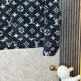 Back view of Louis Vuitton luxury clothing with runway-inspired design