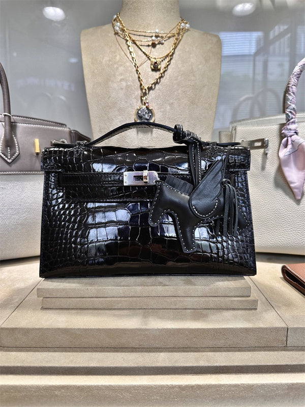  streamlined top-handle bag styled with outfit