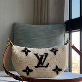  signature shoulder bag detail view showing craftsmanship