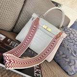 Polished bag shown from front angle