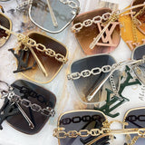 Side view of Louis Vuitton unisex sunglasses