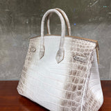 Side view of effortless structured handbag