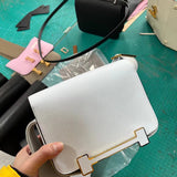 Side view of balanced structured handbag