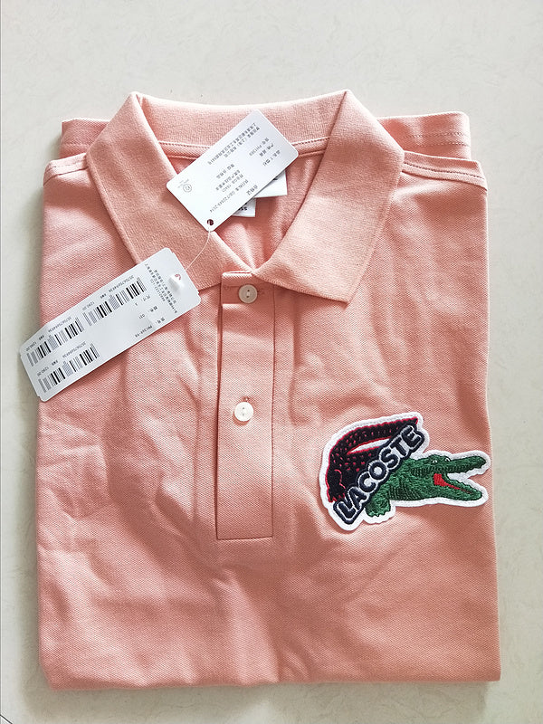 Flat lay presentation of Lacoste luxury clothing with tailored silhouette
