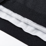 Back view of Louis Vuitton luxury clothing with signature branding