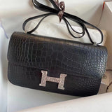 Side view of sophisticated structured handbag
