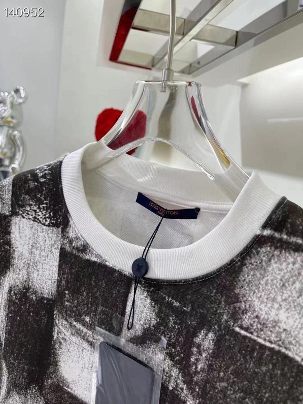 Back view of Louis Vuitton luxury clothing with streetwear-inspired cut