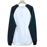 Side profile of Gucci luxury clothing with tailored silhouette