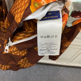 Side profile of Louis Vuitton luxury clothing with everyday silhouette