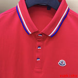 Flat lay presentation of Moncler luxury clothing with logo-detail design