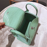 Side view of modern structured handbag