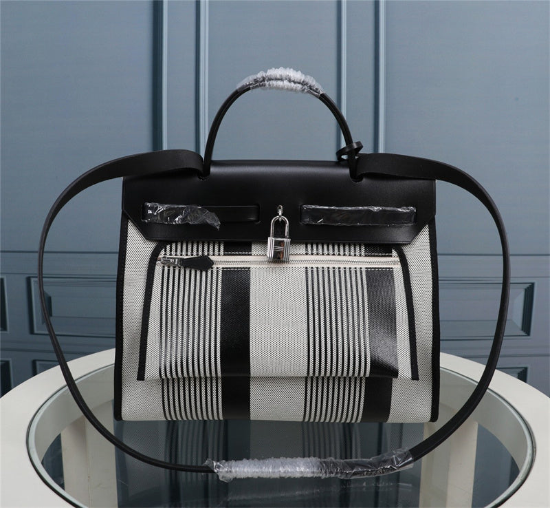 Side view of minimalist structured handbag