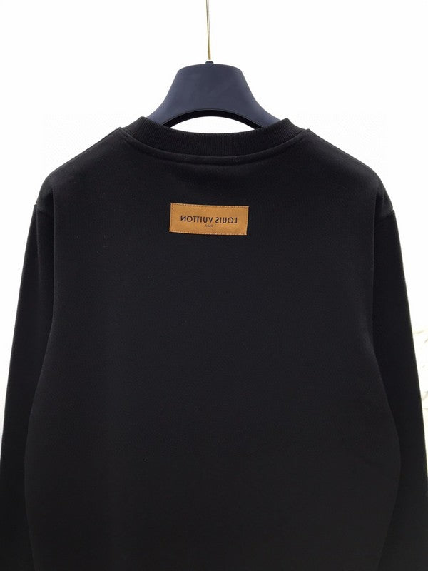 Back view of Louis Vuitton luxury clothing with runway-inspired design