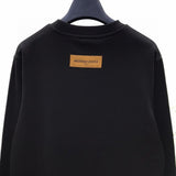 Back view of Louis Vuitton luxury clothing with runway-inspired design