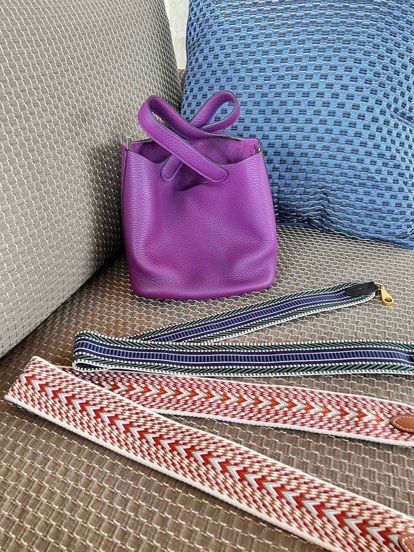 Side view of tailored structured handbag