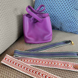 Side view of tailored structured handbag