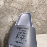 Balenciaga White Crisscross Strap Sandals - Close-Up Texture View