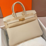 Side view of clean-lined structured handbag