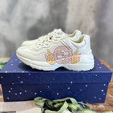 Gucci Designer sneakers in bold contrast sleek tonal finish front view