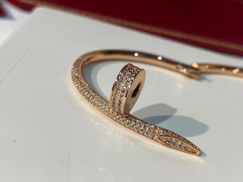 Close-up detail view of Cartier unisex jewelry piece