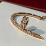Close-up detail view of Cartier unisex jewelry piece