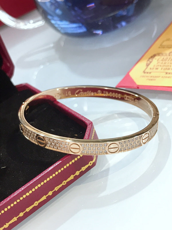 Front view of Cartier unisex jewelry piece