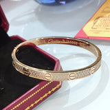 Front view of Cartier unisex jewelry piece