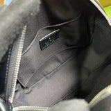 Styled lifestyle shot of refined polished women's handbag – women's luxury handbag