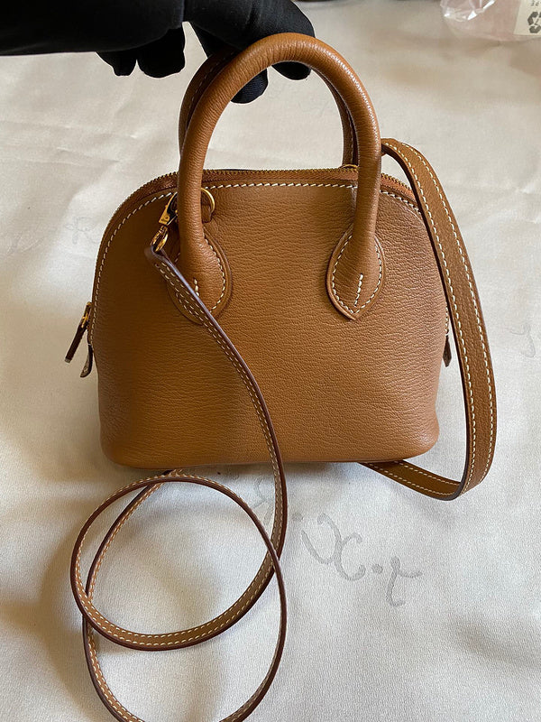 Side view of minimalist structured handbag