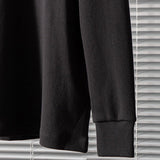 Side profile of Louis Vuitton luxury clothing with label-forward styling