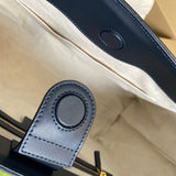 Styled lifestyle shot of classic elevated women's handbag – women's luxury handbag
