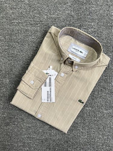 Full styled look of Lacoste luxury clothing with monogram-inspired silhouette