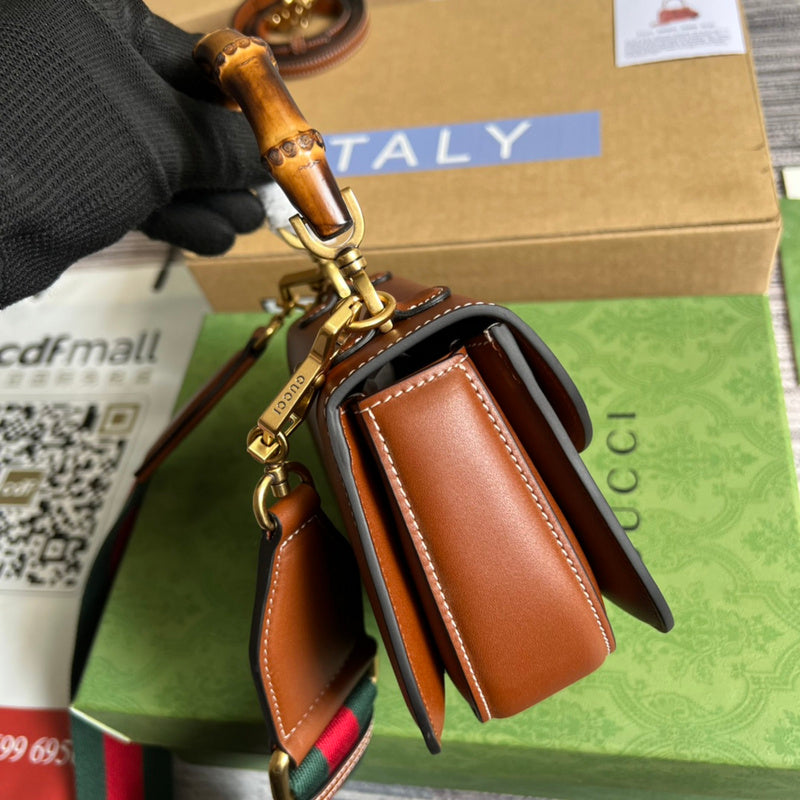 Side view of fluid structured handbag
