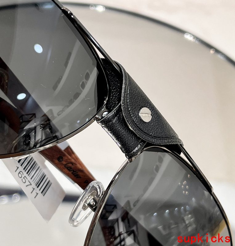 Close-up detail view of Cartier unisex sunglasses