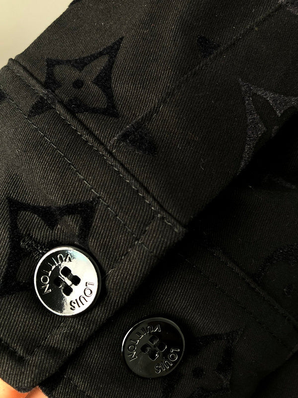 Back view of Louis Vuitton luxury clothing with signature branding
