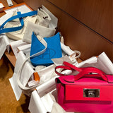 Side view of timeless structured handbag