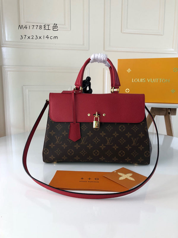 Front view of classic elevated women's handbag – women's statement bag