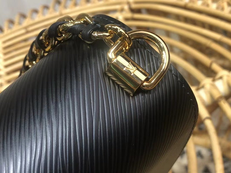 Handle and strap detail of polished premium women's handbag – women's premium purse