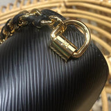 Handle and strap detail of polished premium women's handbag – women's premium purse