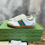 Gucci Designer sneakers in bold contrast signature lace-up style front view