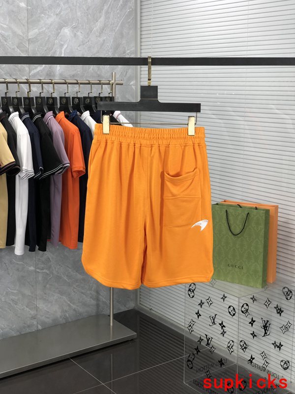 Side profile of Rhude luxury clothing with label-forward styling
