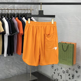 Side profile of Rhude luxury clothing with label-forward styling