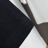 Full styled look of Moncler luxury clothing with relaxed-fit cut
