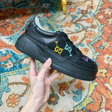 Gucci Casual sneakers in all-black low-top design front view